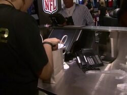 ATMOSPHERE: Fans buy new NFL jerseys at Nike Celebrates NFL Uniform Retail Launch at Niketown Stock Footage