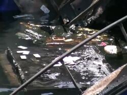 Sinking Boat, Debris Zoom Out Stock Footage