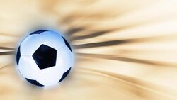 A soccer ball spins in front of a tan background. Stock Footage