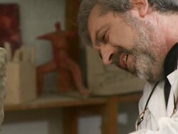 HD DOLLY: Sculptor Artist Making Clay Statue Stock Footage