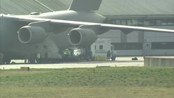 British military healthcare worker with ebola being transferred from RAF Northolt News Clip