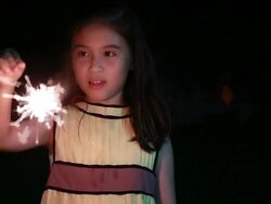 Cute girl Holding sparkler Stock Footage