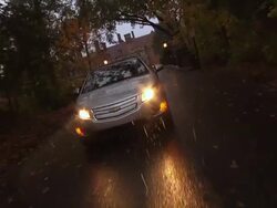 WS POV Electric car passing through countryside in rain / Rochester, Michigan, United States Stock Footage