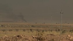 Iraqi soldiers at roadside in firefight with ISIS News Clip