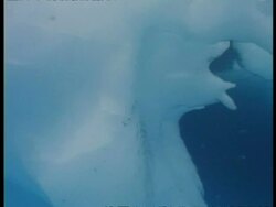 MS underwater shot of base of iceberg, edited sequence, Antarctica Stock Footage