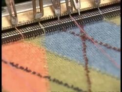 CU Machine weaving patterned jumper Stock Footage