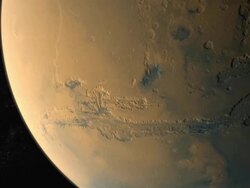 Orbit of the Planet Mars canyons with the moon Phobos Stock Footage