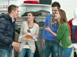 HD DOLLY: Friends Trying Clothes In A Boutique Stock Footage