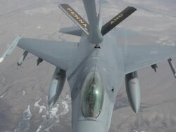 MS F-16 fighter jet refueling in mid-air, Colorado Rockies, Colorado, USA Stock Footage