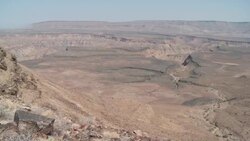 High mesas characterize the Fish River Canyon in Namibia. Stock Footage