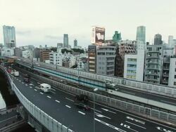 MS T/L View of day to night transition over azabu juban area and shuto-ku elevated highway / Tokyo, Japan Stock Footage