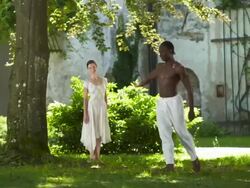HD DOLLY: Two Graceful Ballet Dancers In The Park Stock Footage