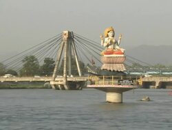 Block shot vishnu statue standing in ganges haridwar uttarakhand Stock Footage
