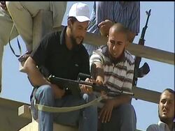 Rebel fighters backed by an escalating NATO bombing campaign are converging on Gadhafi''s hometown of Sirte, his last major bastion of support in largely rebel-controlled Libya, amid speculation the longtime Libyan leader might be hiding there. News Clip