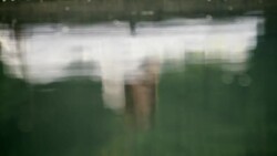 Woman awakening on lake Stock Footage