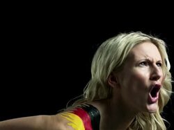 Angry woman shouting with German flag painted on shoulder Stock Footage