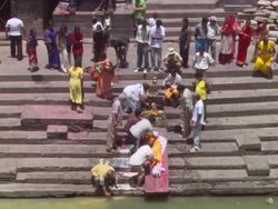 WS Body being prepared in  traditional funeral fashion / Kathmandu, Central, Nepal Stock Footage