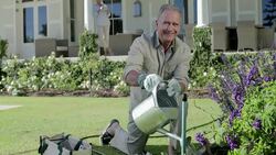 Portrait of smiling senior man gardening Stock Footage