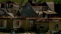 Wrecked homes and vehicles are seen in Hoisington, Kansas following a tornado. Stock Footage