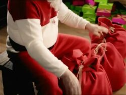 ZI, CU, Santa Close tying up red sacks, Slovenia Stock Footage