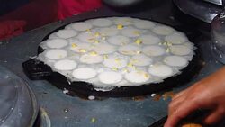 Cooking Thai dessert , Coconut milk mix with powder fried dessert. Stock Footage