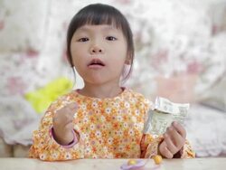 CU Shot of Little girl eating biscuit / Xi'an, Shaanxi, China Stock Footage