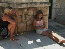 Mother and daughter playing cards Stock Footage