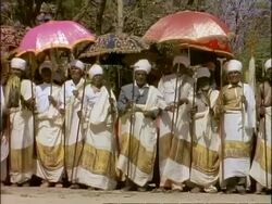 MS Group of African clerics singing for Palm Sunday service, Ethiopia, Africa Stock Footage
