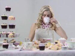 Young woman drinking tea Stock Footage