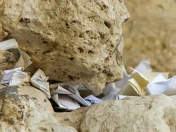 CU PAN Slips of paper containing written prayers to God / Jerusalem, Judea, Israel Stock Footage