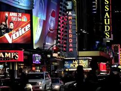 The Neon lights of New York city and Times Square at night, Manhattan, New York, North America, USA Stock Footage