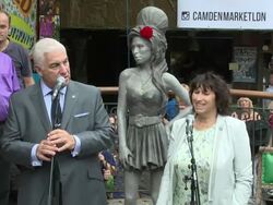 Mitch Winehouse & Janis Winehouse at Amy Winehouse statue unveiling on 14th September 2014 in London, England. Stock Footage