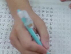 Shot of writing Chinese Script with ballpoint pen at Jeonju Hanongmaeul village Stock Footage