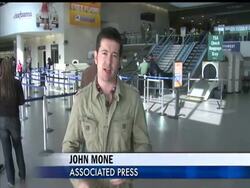 The lines of Thanksgiving travelers moved smoothly at airports around the country Wednesday despite an Internet campaign to get passengers to gum up the works on one of the busiest days of the year by refusing full-body scans. News Clip