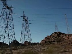 POV Electrical towers in desert / Hoover Dam,Arizona,USA   Stock Footage