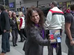 Steven Tyler of Aerosmith poses with the new CD outside of the Late Show in New York, NY, on 11/01/12 (Getty Images Entertainment Video) Stock Footage