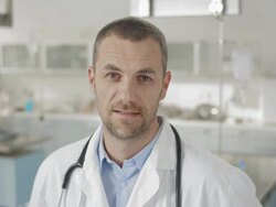 Doctor Nodding At The Camera Stock Footage