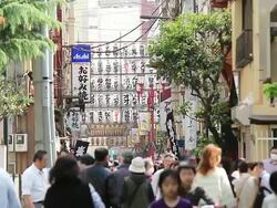 MS Signs and pedestrian / Asakusa, Tokyo, Japan Stock Footage