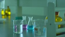 pipette and a microscope in a lab Stock Footage