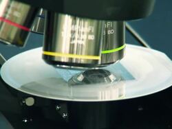 The microscopes lens and semiconductors chips Stock Footage