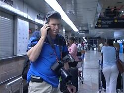 Scuffle at airport as nanny and 'Madonna child' arrive News Clip