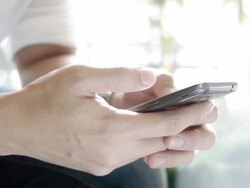 Young man using smartphone. Stock Footage