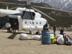 MS Shot of Sherpa's unload from helicopter / SoluKhumbu, Nepal Stock Footage
