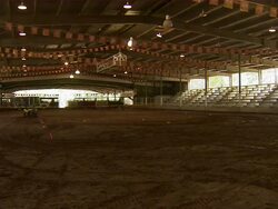 Long shot of child driving ATV through the obstacle course. Stock Footage