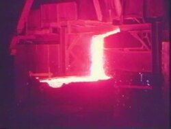 Blast furnace producing molten ore Stock Footage