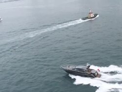 MS AERIAL TS Shot of Fast Speed Boat on Harbor / Hong Kong, China Stock Footage