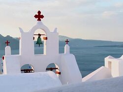 MS Shot of church bells at village Oia / Santorini, Cyclades, Greece Stock Footage