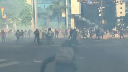CLEAN : Protesters injured during violent clashes with police in Caracas News Clip