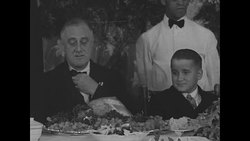 Pres. Franklin Roosevelt hosts Thanksgiving dinner at the Georgia Warm Springs Foundation News Clip