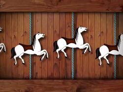 old wooden merry-go-round carrusel child's play Stock Footage